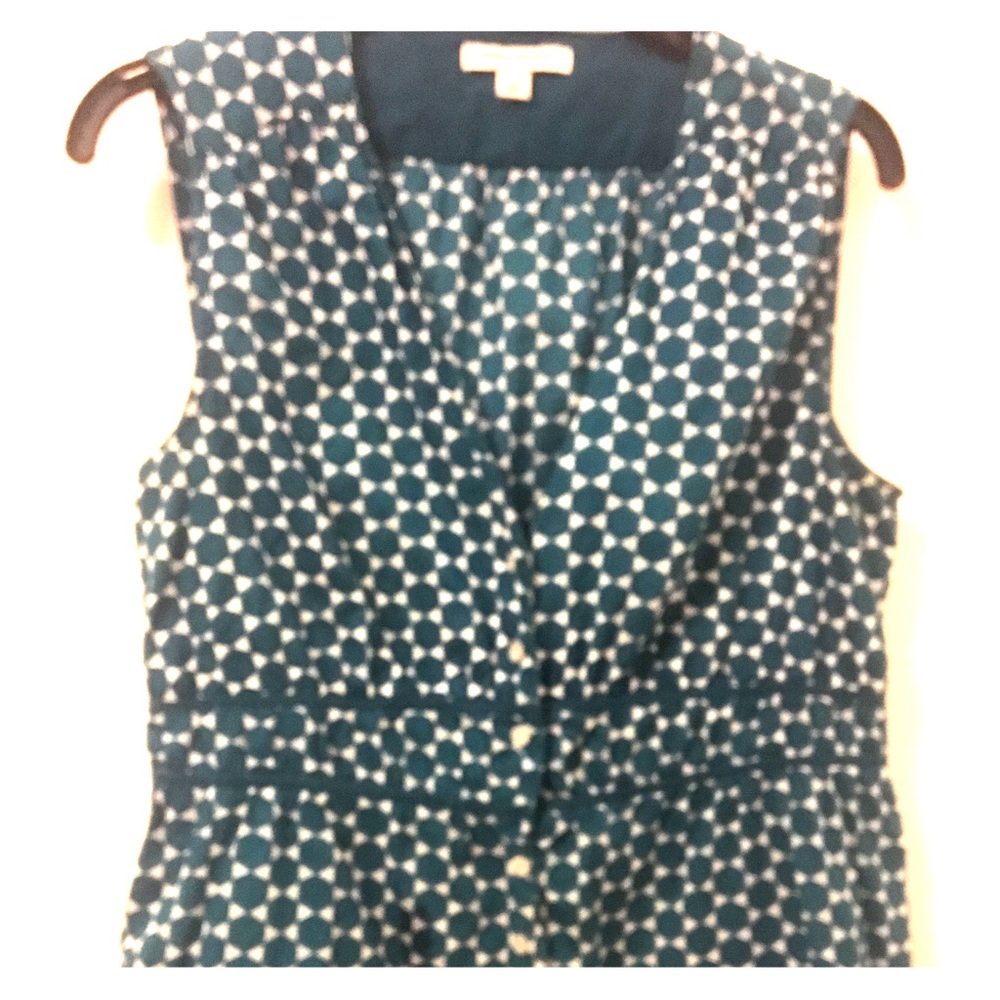 Button down peplum top
Size: Medium